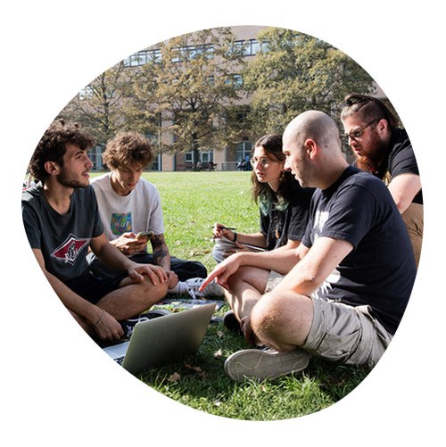 Group of students at the park talking