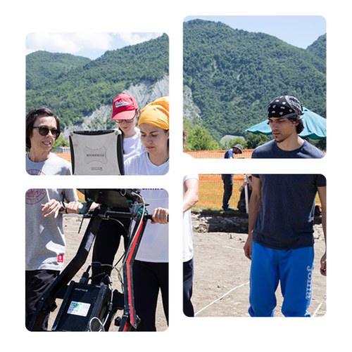 Gruppo di studenti ricercatori in posa con divisa da lavoro