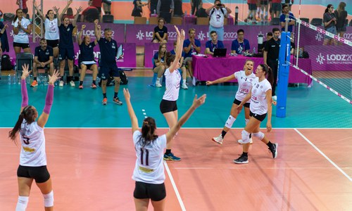 Female volleyball players on the court